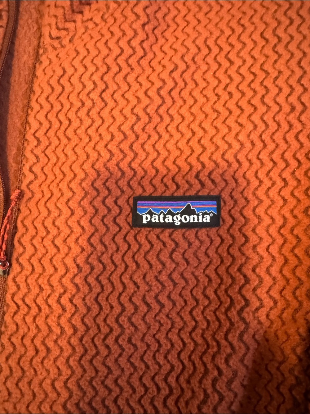 Patagonia women’s Rust Orange Zip-Up Fleece Sweater